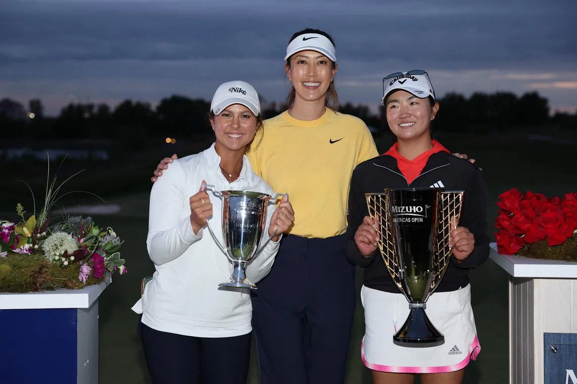 Michelle Wie West (centre) with Yana Wilson (left) and Rose Zhang after the final round of the Mizuho Americas Open on June 4.