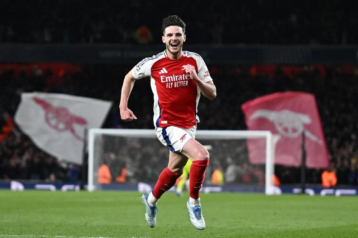 Soccer Football - Champions League - Quarter Final - First Leg - Arsenal v Real Madrid - Emirates Stadium, London, Britain - April 8, 2025
Arsenal's Declan Rice celebrates scoring their second goal REUTERS/Dylan Martinez