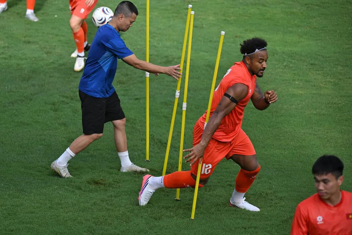 Rafaelson training with the Vietnam team in Hanoi on July 29. The Brazil-born forward will be the dangerman when Vietnam face Singapore on July 31.