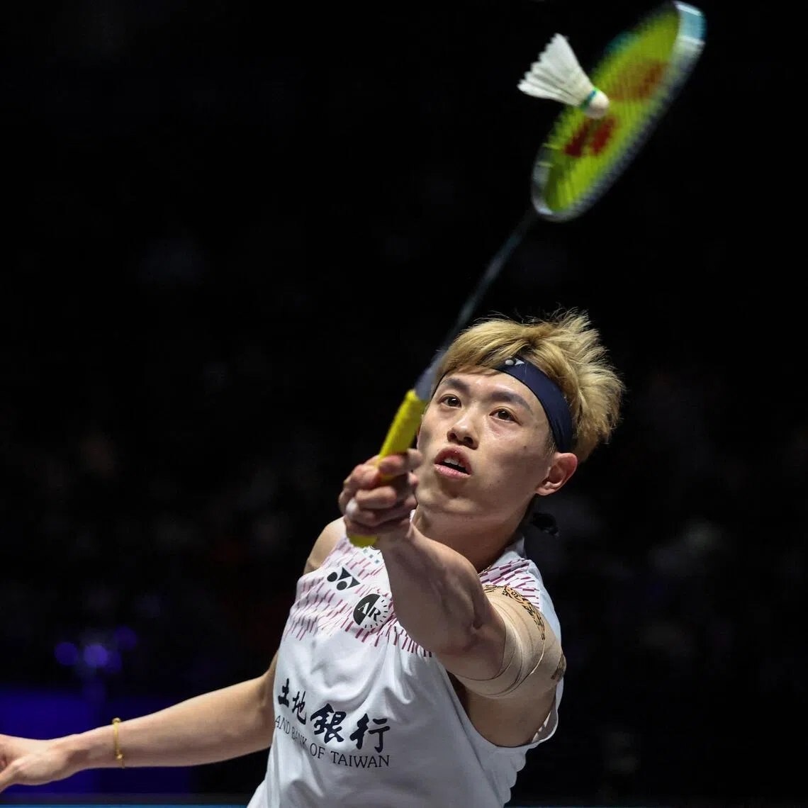 Chinese Taipei's Lin Chun-yi hits a return against India's Lakshya Sen during their singles final at the All England Open at the Utilita Arena in Birmingham.