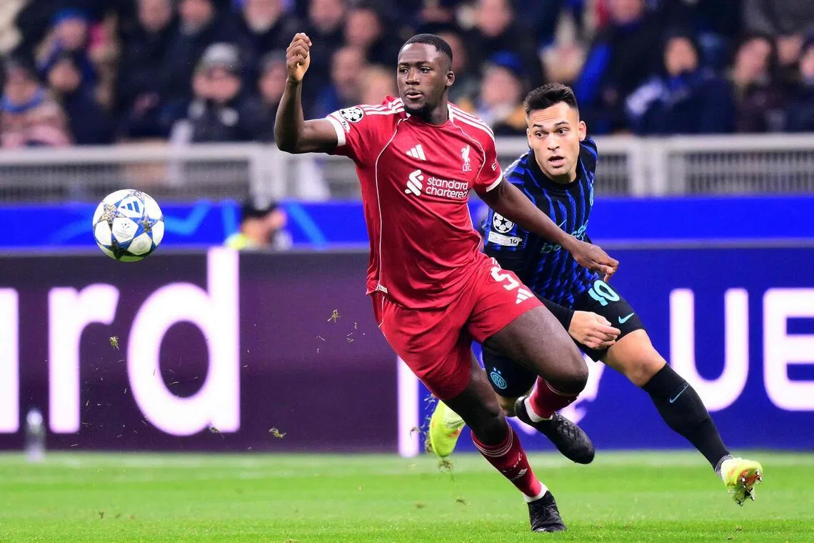 Liverpool's Ibrahima Konate in action (left) with Inter Milan's Lautaro Martinez on Dec 9, during a UEFA Champions League match.
