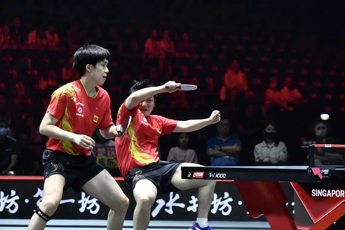 China's Wang Chuqin and Fan Zhendong beat South Korea's Lim Jong-hoon and Jang Woo-jin 3-1 (9-11, 13-11, 11-7, 11-4) to retain their men's doubles title at the Singapore Smash.