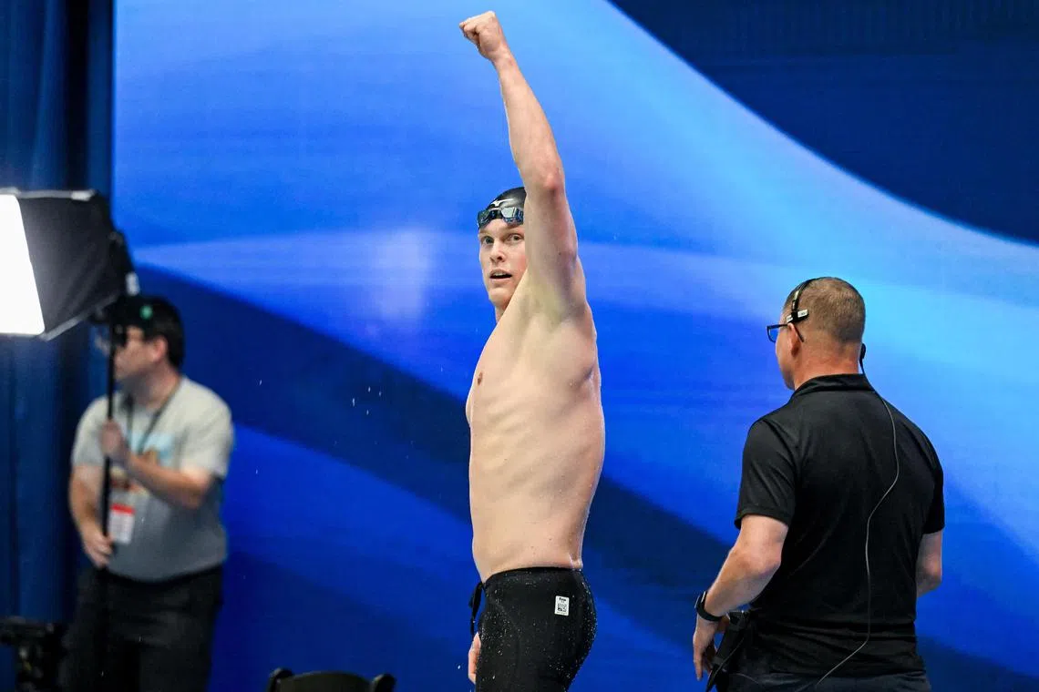 Luke Hobson celebrates after winning the men’s 200m freestyle.