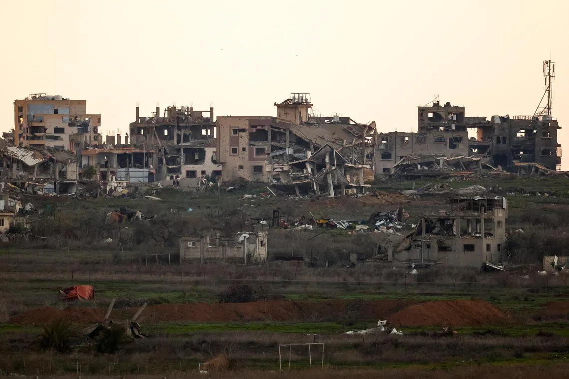 Buildings lie in ruin in North Gaza, amid a ceasefire between Israel and Hamas, as seen from Israel, February 12, 2025. REUTERS/Amir Cohen/File Photo