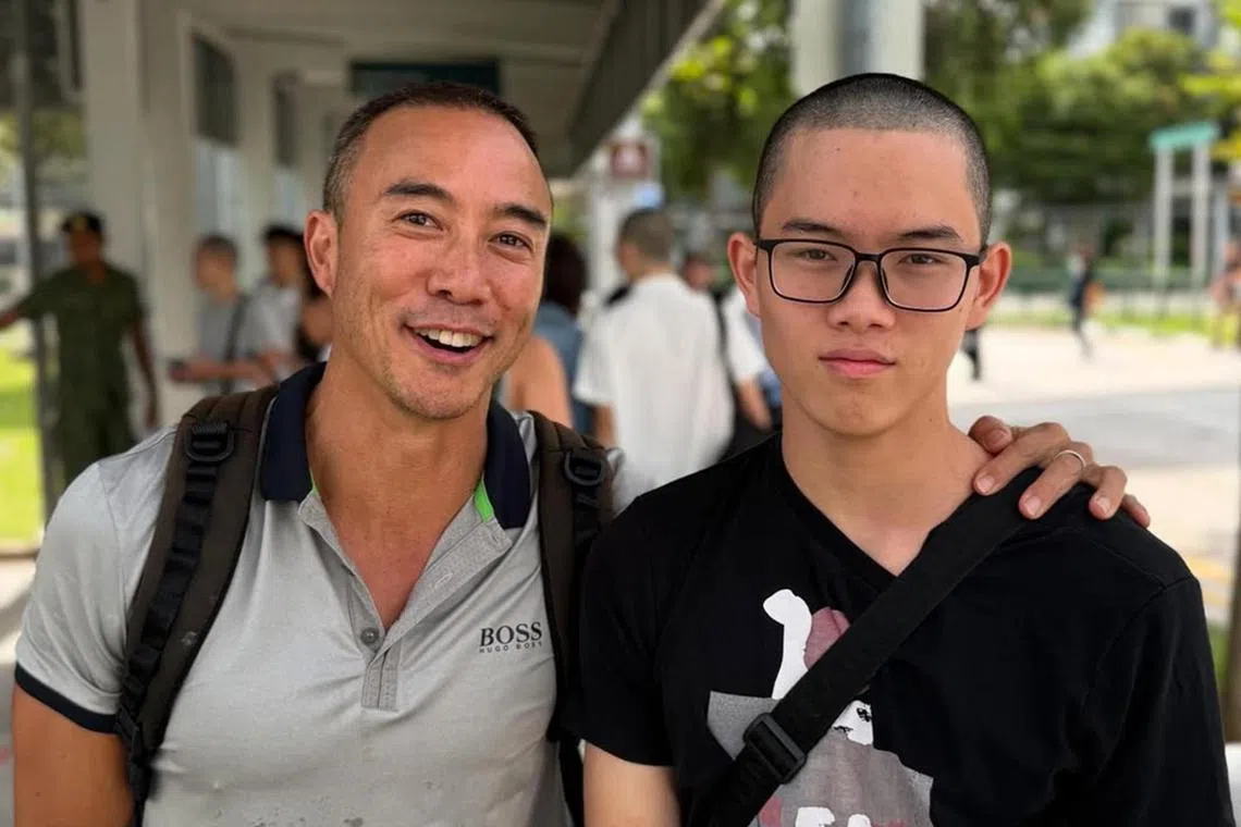 Television presenter Allan Wu (left) with his son Jonas, who began National Service on Jan 7. 