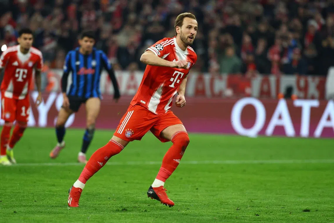 Soccer Football - UEFA Champions League - Round of 16 - Second Leg - Bayern Munich v Atalanta - Allianz Arena, Munich, Germany - March 18, 2026 Bayern Munich's Harry Kane celebrates scoring their first goal REUTERS/Kai Pfaffenbach