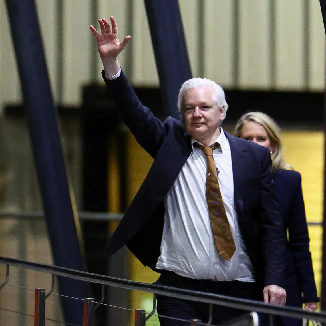 WikiLeaks founder Julian Assange waves as he arrives in Canberra, Australia, June 26, 2024. REUTERS/Edgar Su/ File Photo