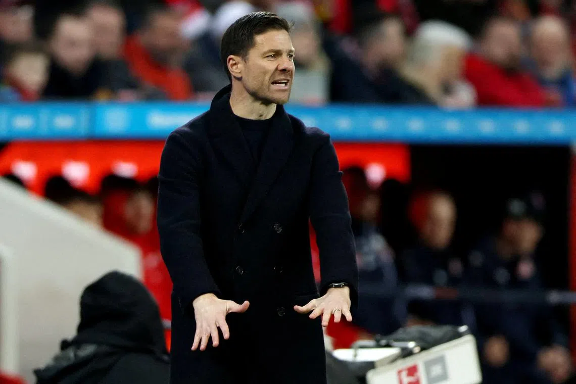 FILE PHOTO: Soccer Football - Bundesliga - Bayer Leverkusen v 1.FSV Mainz 05 - BayArena, Leverkusen, Germany - February 23, 2024 Bayer Leverkusen coach Xabi Alonso reacts REUTERS/Thilo Schmuelgen/File Photo