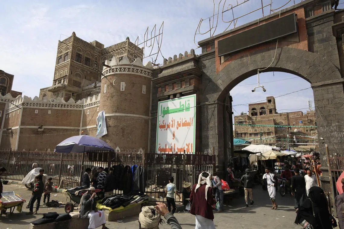 A banner reading "Boycott US and Israeli products'" on the Yemen Gate in Sanaa.