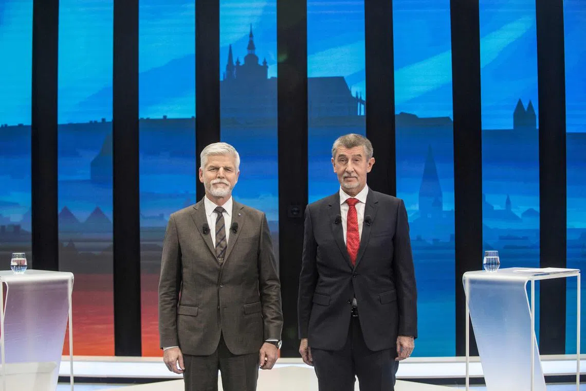 Former paratrooper Petr Pavel (left) topped final opinion polls with 58-59 per cent support, against 41-42 per cent for Mr Andrej Babis.