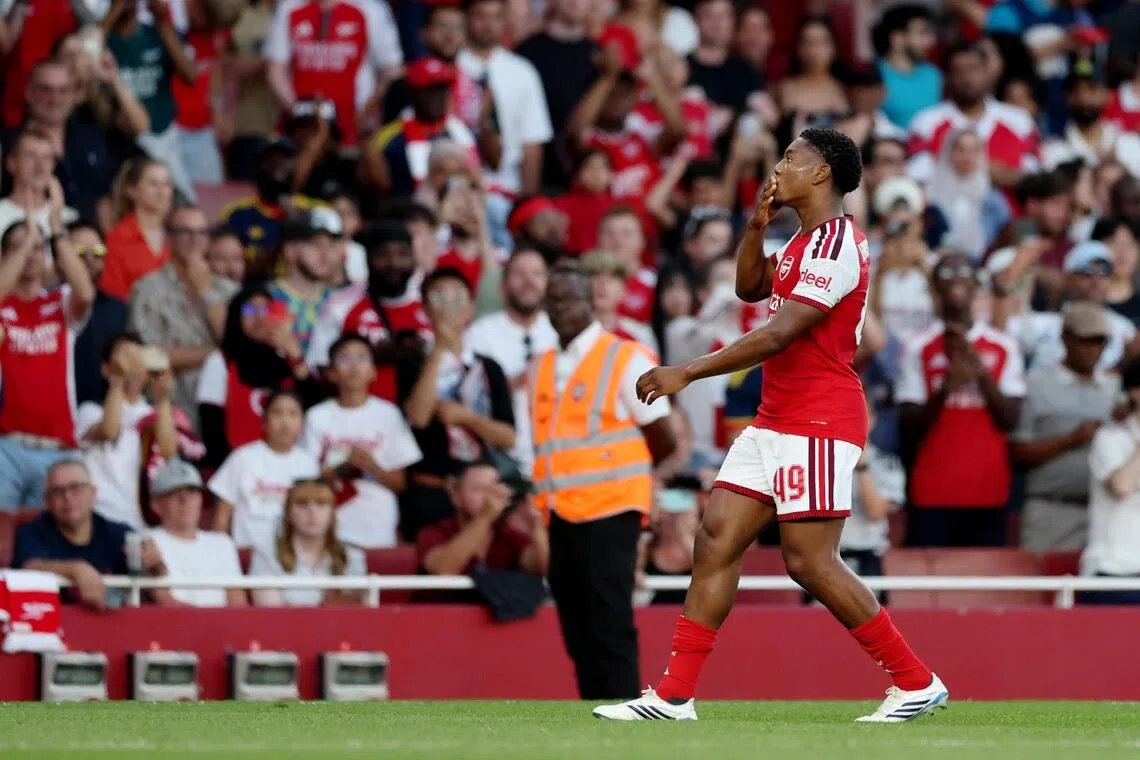 Arsenal’s Myles Lewis-Skelly celebrating after scoring the opener in a 1-1 friendly draw with Como at the Emirates on Aug 12.