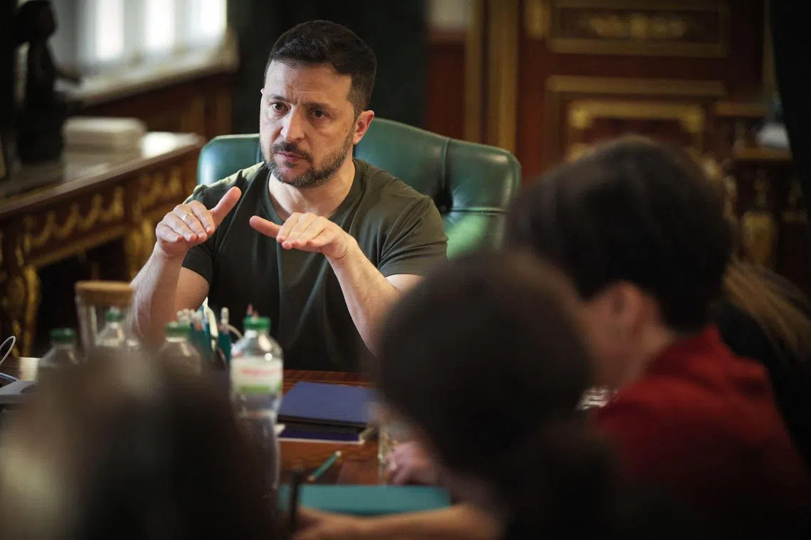 Ukrainian President Volodymyr Zelensky talking with journalists in Kyiv on May 2, in a press briefing that was embargoed until May 3.