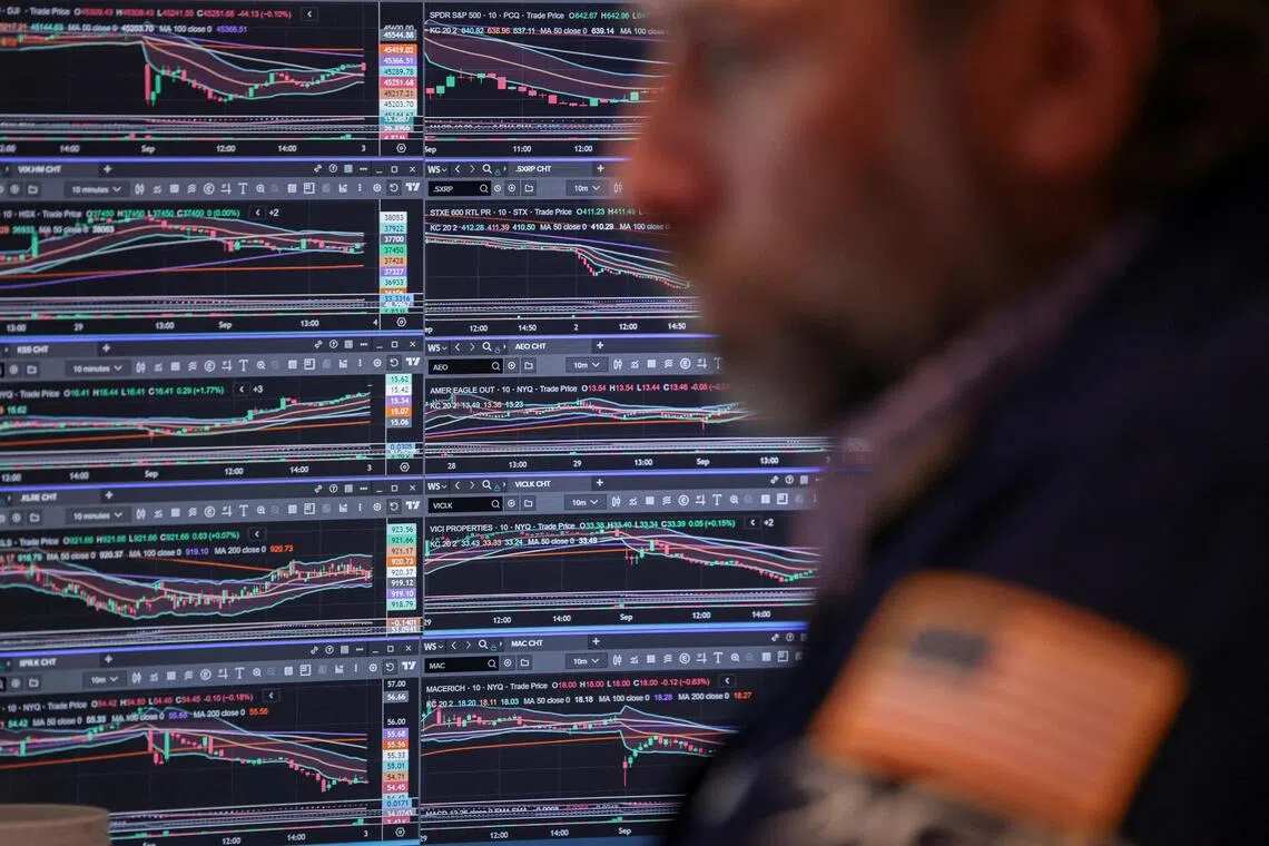 A trader works on the floor at the New York Stock Exchange in New York City, US.