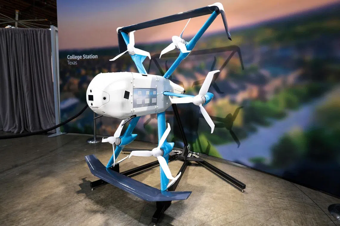 TOPSHOT - Amazon's new MK30 Prime Air drone is displayed during Amazon's "Delivering the Future" event at the company's BFI1 Fulfillment Center, Robotics Research and Development Hub in Sumner, Washington on October 18, 2023. (Photo by Jason Redmond / AFP)