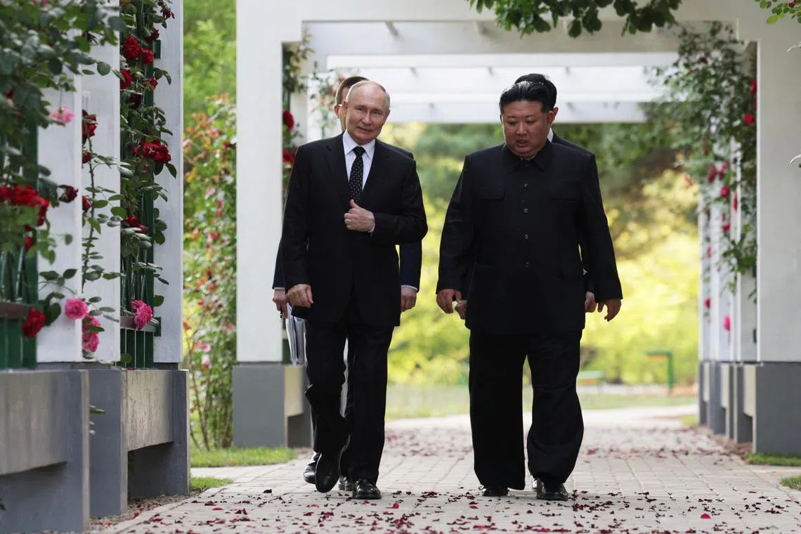 Russia's President Vladimir Putin and North Korea's leader Kim Jong Un walk during a meeting in Pyongyang, North Korea June 19, 2024. Sputnik/Gavriil Grigorov/Pool via REUTERS