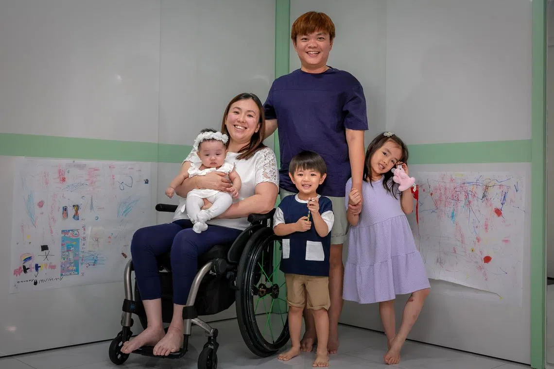 Jean Ling with her husband Jake Oh and their three children Summer, 6,  Evan, 2, and Adel, 5 months, in their home on June 23, 2025.