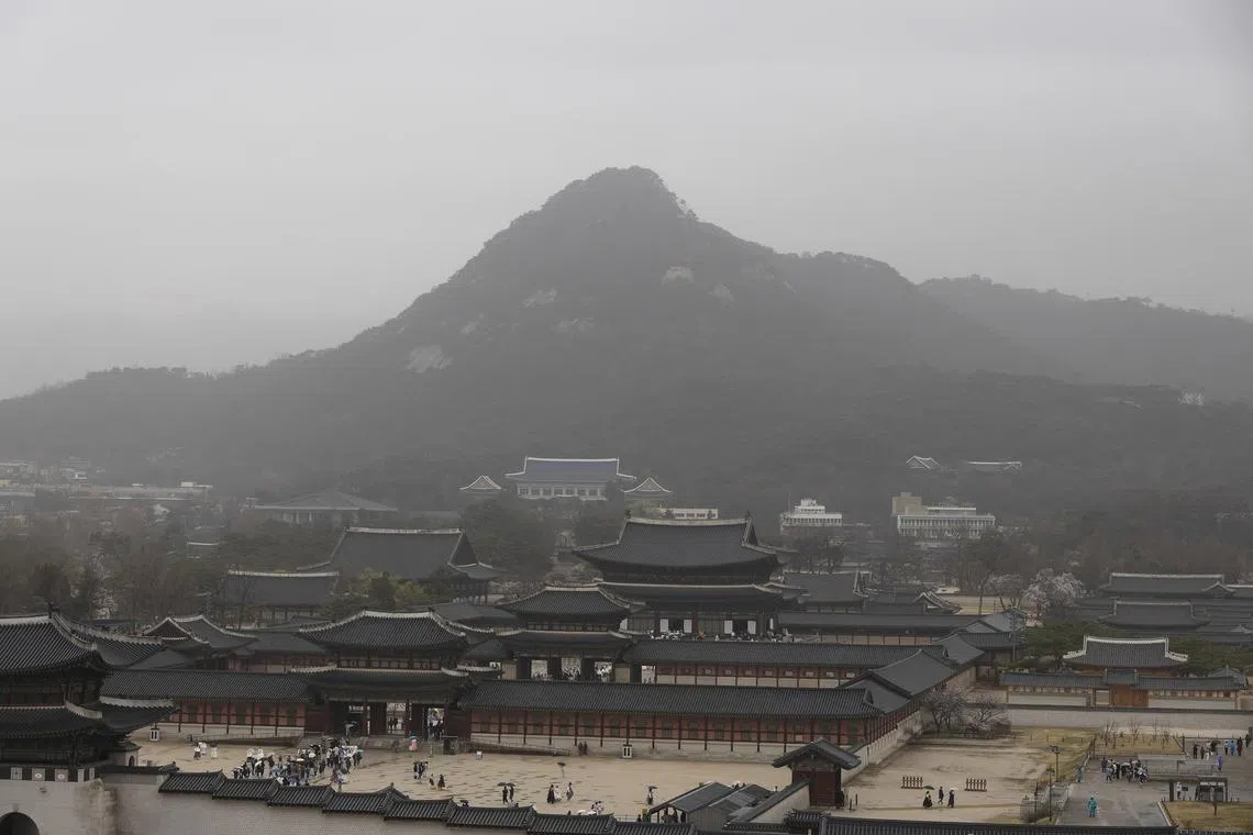 The sky above Seoul's Gyeongbokgung palace could be seen obscured by yellow dust. 