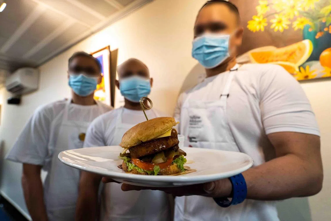 bdcook16 - The winning team with their dish, Teriyaki Hawaiian Burger.

Credits: Singapore Prison Service
Copyright: Singapore Prison Service
Source: Singapore Prison Service
Rights usage term: One time use