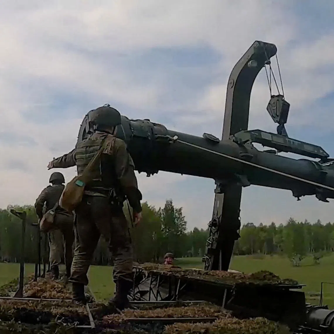Russian service members take part in a nuclear forces exercise at an unidentified location in Russia, in this still image taken from handout footage released on May 20, 2026.  Russian Defence Ministry/Handout via REUTERS