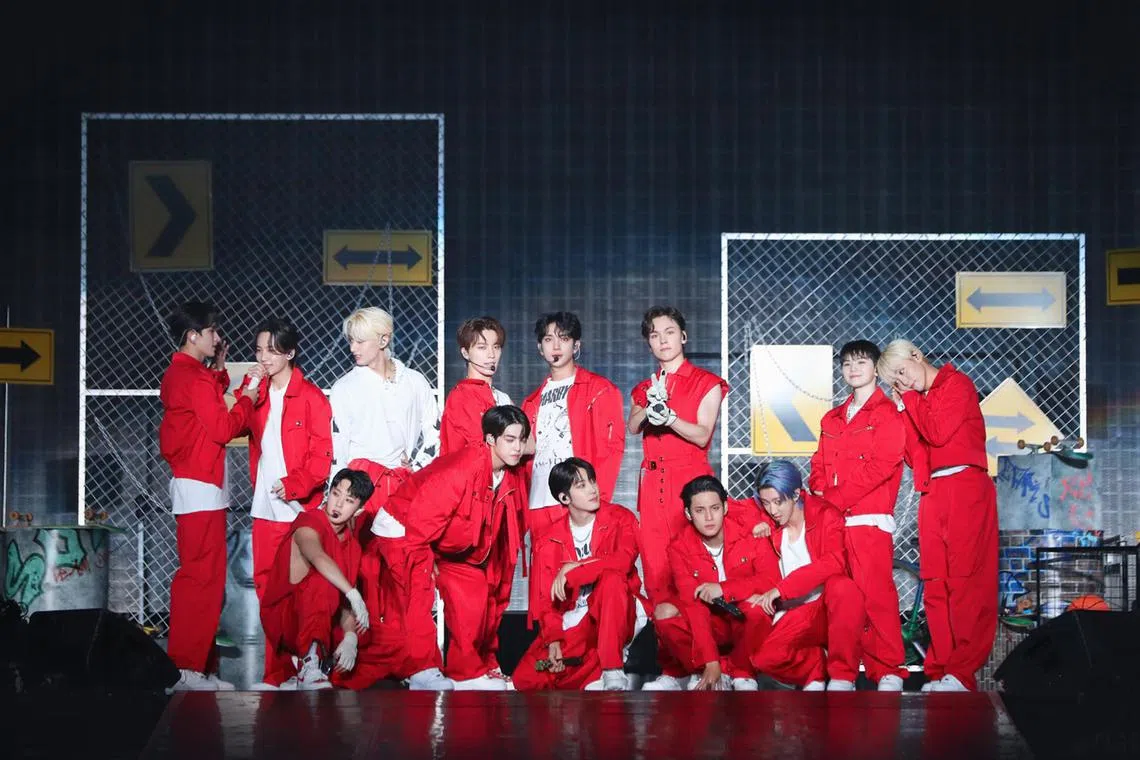 The members of Seventeen performing at the Singapore Indoor Stadium on Oct 13, 2022.
