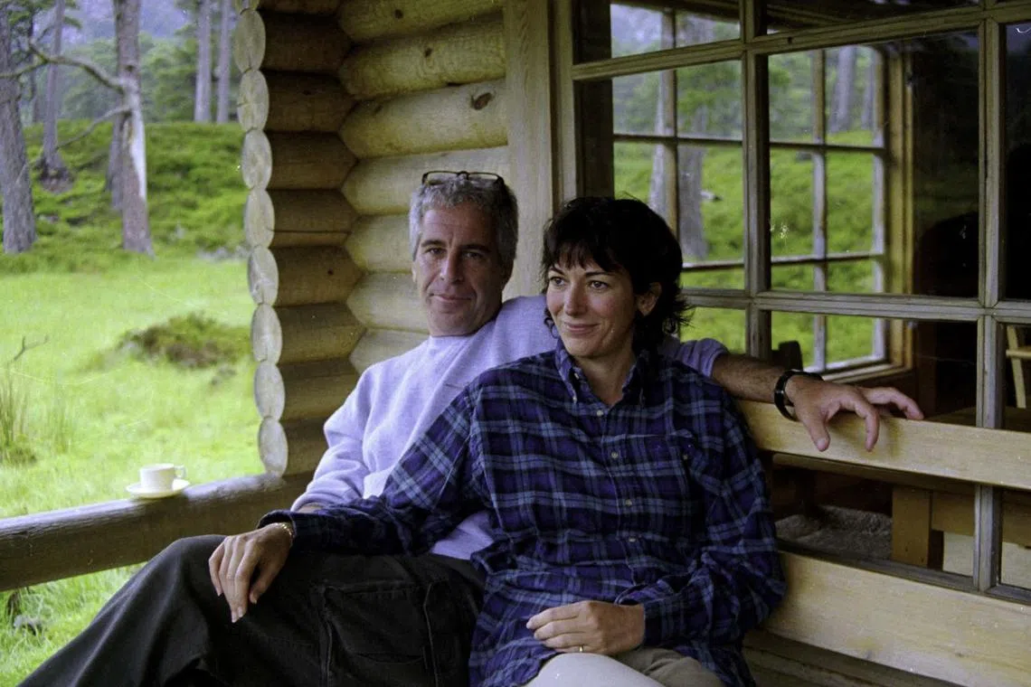 This undated trial evidence image obtained in 2021 shows British socialite Ghislaine Maxwell and US financier Jeffrey Epstein. 