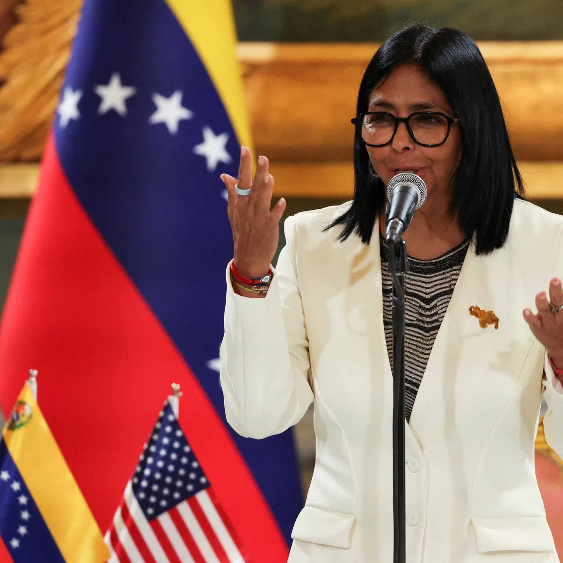 FILE PHOTO: Venezuelan acting President Delcy Rodriguez speaks as she attends the signing of an agreement between U.S. oil major Chevron and government officials to expand the company's operations, at Miraflores Palace, in Caracas, Venezuela, September 2, 2026. REUTERS/Leonardo Fernandez Viloria/File Photo