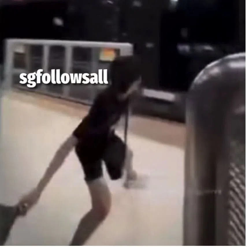 Online footage shows the boy hurling the bag off Cove LRT platform.