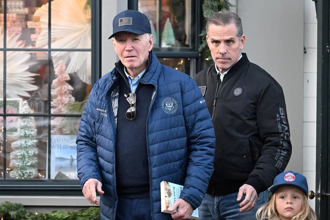 US President Joe Biden, accompanied by Hunter Biden and Beau Jr., in downtown Nantucket, Massachusetts, US, on Nov 29, 2024.
