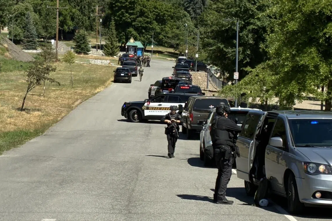The firefighters were responding to a small brush fire that broke out in the Canfield Mountain nature area when they came under gunfire.