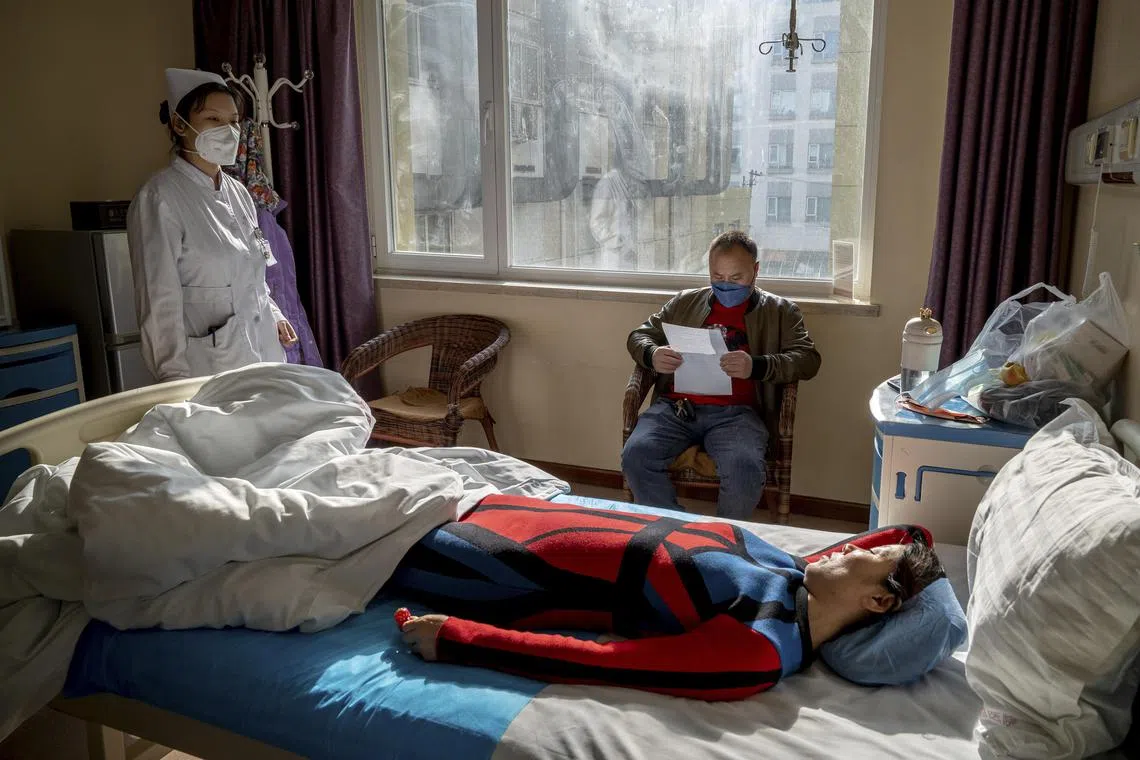 Ms Guo Meiyan rests in her room after an IVF transfer embryo procedure at Beijing Perfect Family Hospital, on Nov 23, 2022.