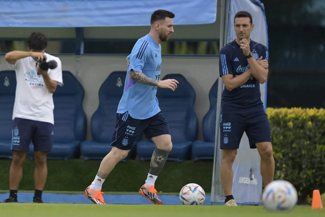 Lionel Messi and Argentina coach Lionel Scaloni during a training session in March, 2023. Messi's club football future is uncertain as he is unlikely to renew his contract with Paris Saint-Germain.