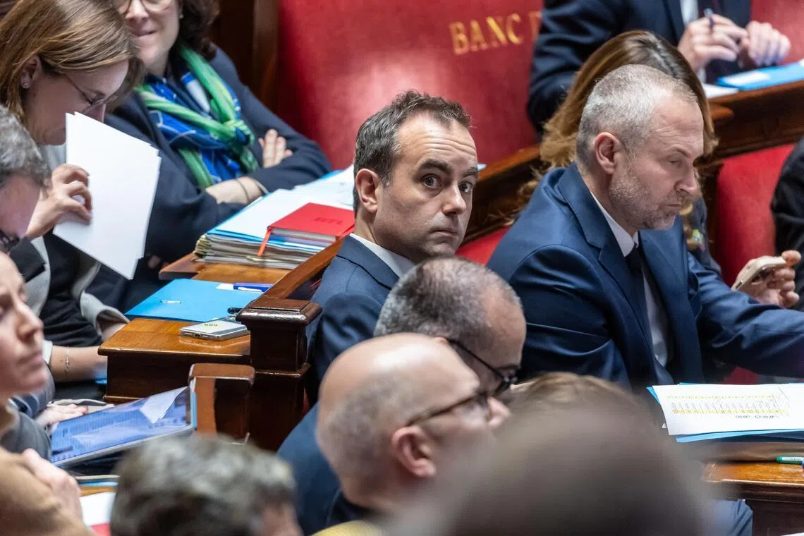 French Prime Minister Sebastien Lecornu (centre) and his government will now likely face no-confidence motions from the opposition.