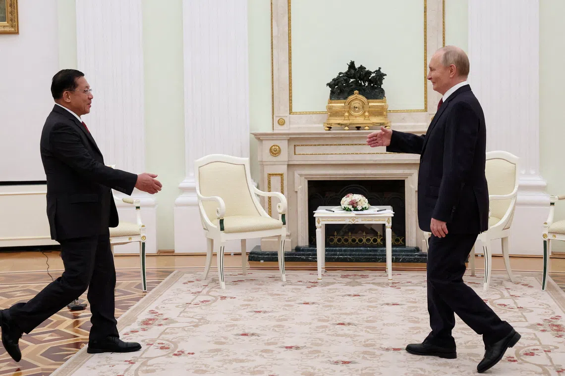 FILE PHOTO: Russia's President Vladimir Putin and Myanmar's military chief Min Aung Hlaing attend a meeting at the Kremlin in Moscow, Russia, September 25, 2025. REUTERS/Ramil Sitdikov/Pool/File Photo