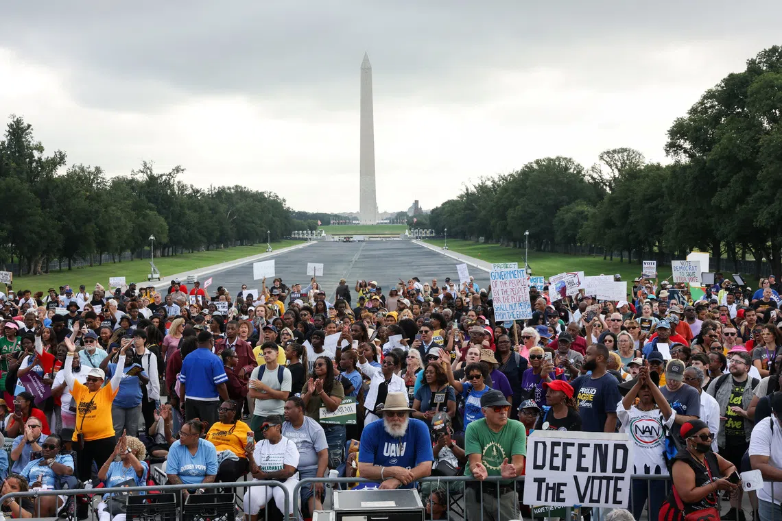People attend the \"March on Washington 2026: Defend the Vote\" rally and march for voting rights, at the Lincoln Memorial in Washington D.C., U.S., August 28, 2026. REUTERS/Leah Millis