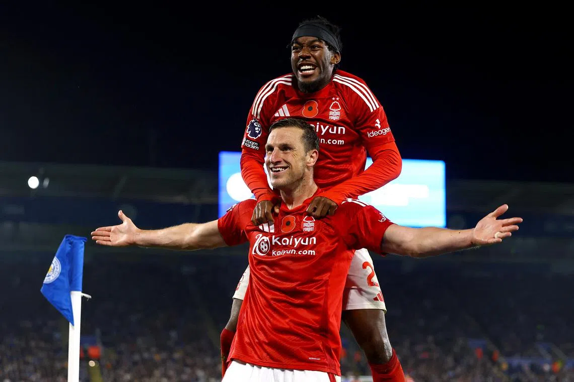 Nottingham Forest's Chris Wood celebrates scoring their third goal - his second - with Anthony Elanga.