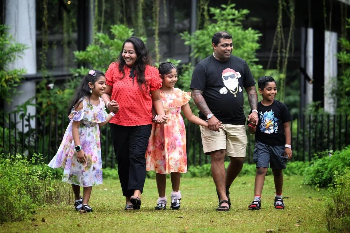 Beneficiaries Sivamaran Darmarajan, 41 and his wife, Marthiana Sarip, 41 with their children ( from left) Shivana Sivamaran, 10, Shivani Sivamaran,9 and Shakti Sivamaran, 6 at Sinda?s Back To School Festival on Nov 23, 2025.