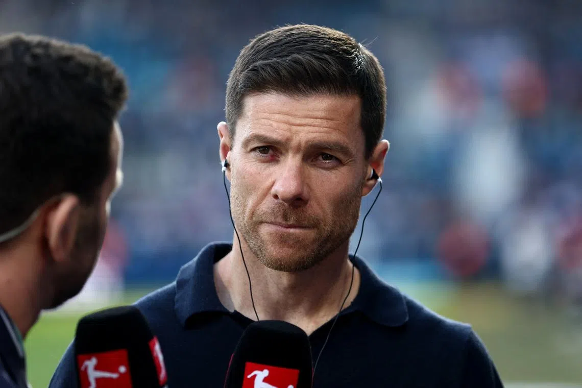 Soccer Football - Bundesliga - VfL Bochum v Bayer Leverkusen - Ruhrstadion, Bochum, Germany - May 12, 2024 Bayer Leverkusen coach Xabi Alonso during an interview before the match REUTERS/Leon Kuegeler