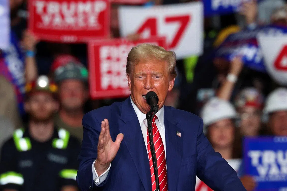 FILE PHOTO: Republican presidential nominee and former U.S. President Donald Trump speaks as he holds a rally at the Cambria County War Memorial Arena in Johnstown, Pennsylvania, U.S. August 30, 2024. REUTERS/Brian Snyder/File Photo