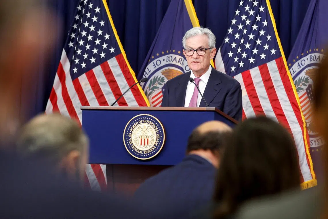 US Federal Reserve chairman Jerome Powell addresses reporters after the Fed raised its target interest rate by a quarter of a percentage point.