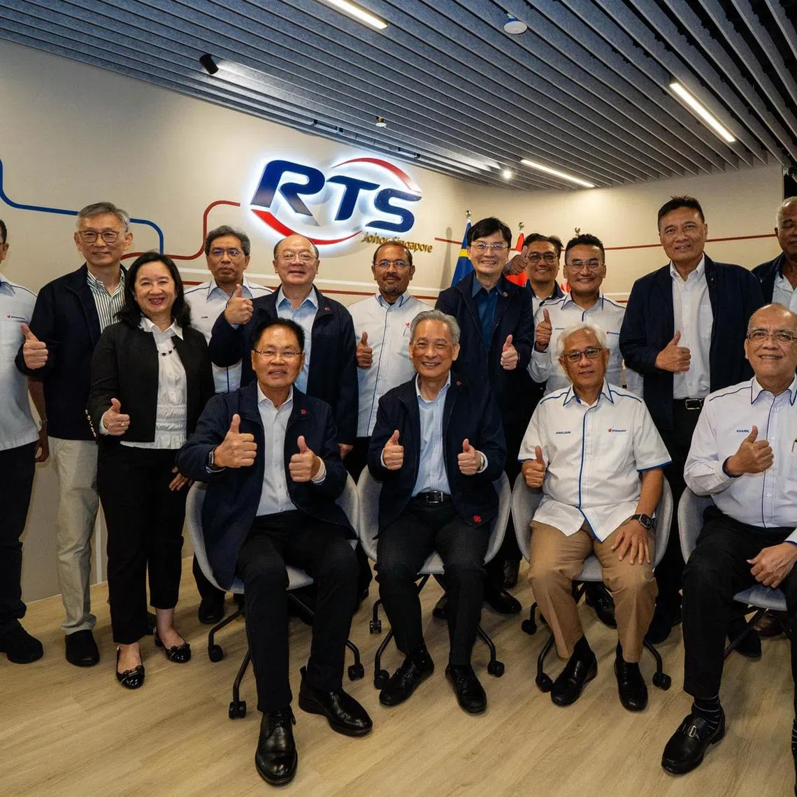 yfrts05 - (Seated in the first row, from left) RTS Operations vice-chairman and SMRT board member Yap Kim Wah, SMRT chairman Seah Moon Ming, Prasarana chairman Jamaludin Ibrahim and RTS Operations chairman Khairil Anwar Ahmad posing for a photo at the opening of RTS Operations' new corporate office in Johor Bahru on Feb 5, 2025. SMRT group chief executive Ngien Hoon Ping and Prasarana group chief executive Mohd Azharuddin Mat Sah (centre) were also in attendance.

Credit: Facebook / RTSO