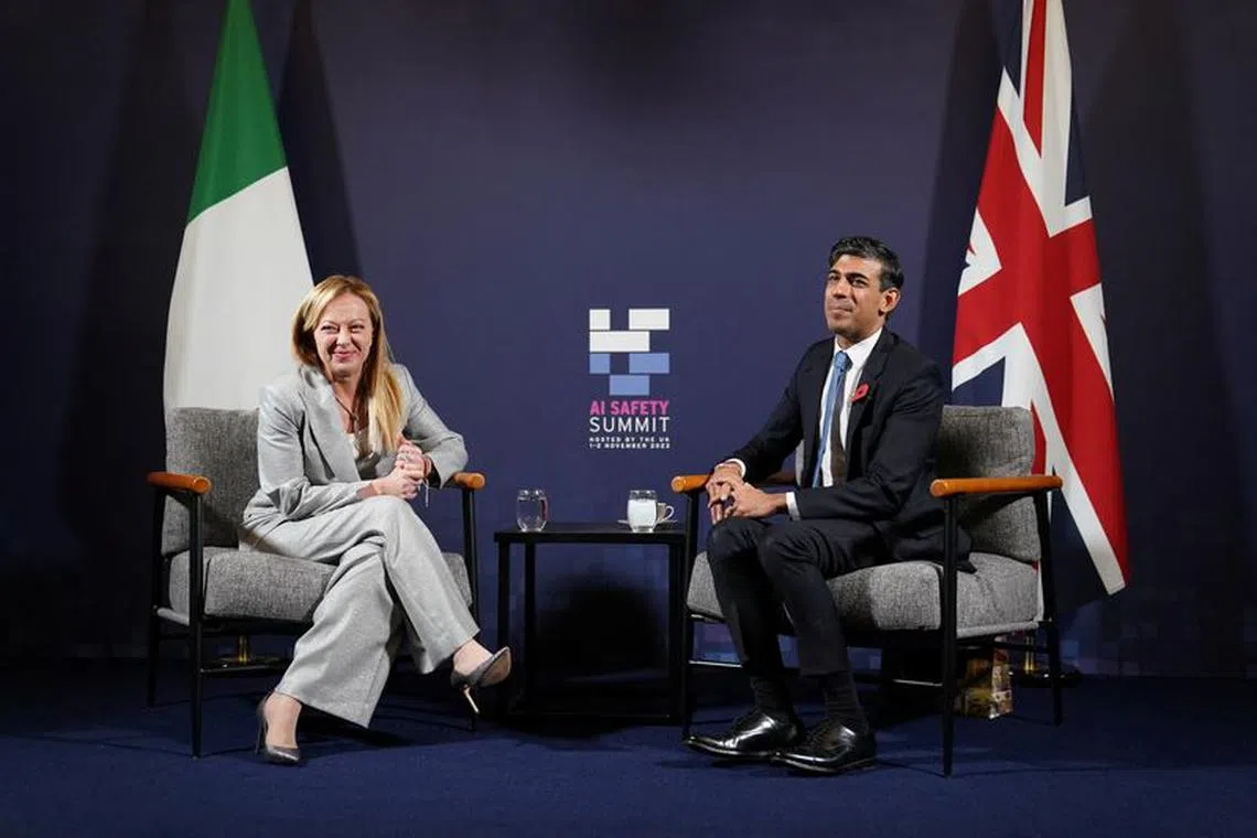 FILE PHOTO: Britain's Prime Minister Rishi Sunak meets with Italy's Prime Minister Giorgia Meloni during the UK Artificial Intelligence (AI) Safety Summit at Bletchley Park in Milton Keynes, Buckinghamshire, Britain November 2, 2023.  Joe Giddens/Pool via REUTERS/File Photo