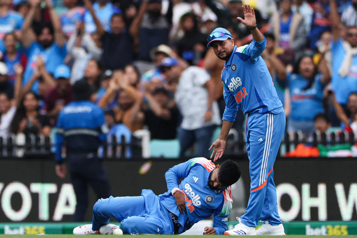 Cricket - One Day International - Australia v India - Sydney Cricket Ground, Sydney, Australia  - October 25, 2025 India's Shreyas Iyer reacts after taking a catch to dismiss of Australia's Alex Carey as India's Kuldeep Yadav looks on REUTERS/Hollie Adams