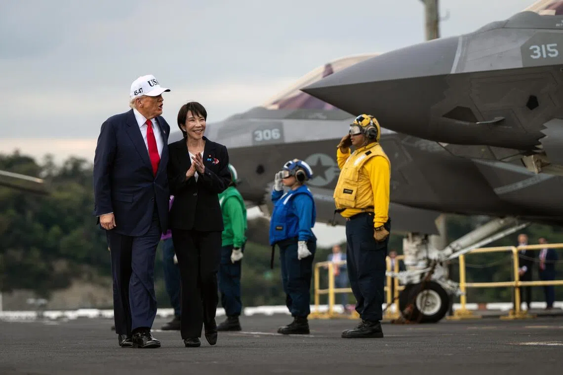 US President Donald Trump and Japan’s Prime Minister Sanae Takaichi aboard the USS George Washington in Yokosuka in 2025