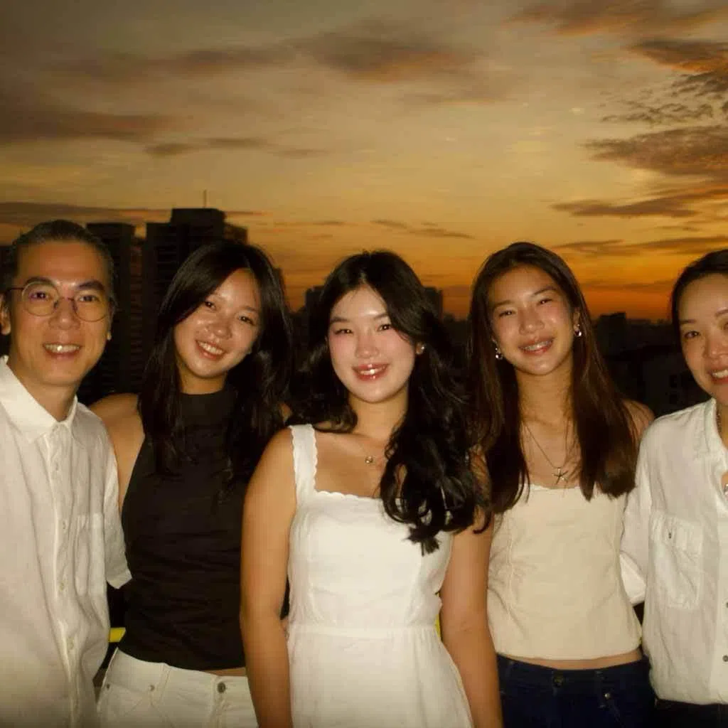 the foong family from singapore, who share a love of football, pictured from left: father zacc foong, sisters tia foong, tasha foong and tyan foong, and mother deon loon