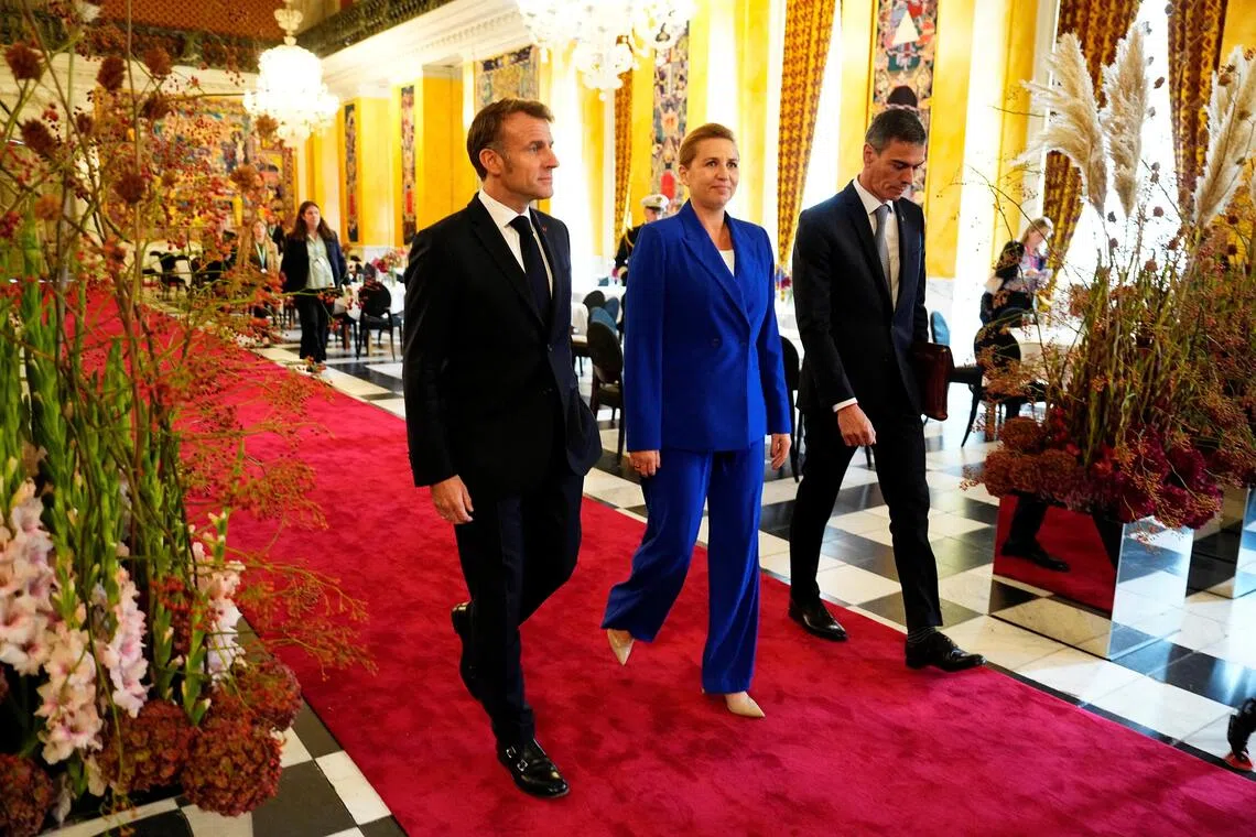 Danish Prime Minister Mette Frederiksen (centre) arriving for the Oct 1 meeting of EU leaders with French President Emmanuel Macron (left) and Spanish Prime Minister Pedro Sanchez.