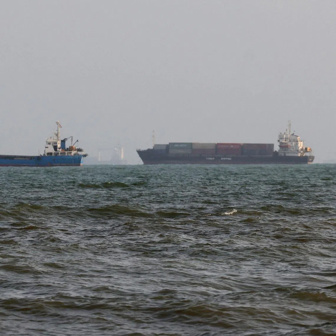 Vessels are seen in the Strait of Hormuz, off the port city of Bandar Abbas in southern Iran, on Aug 10.
