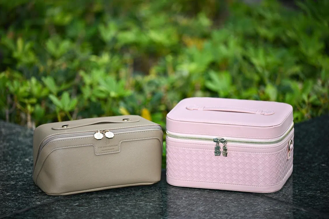 ST20240916-202477200951-Lim Yaohui-Chin Hui Shan-hsmooncake/
Mooncake boxes in the form of cosmetic pouch (left) and jewellery box (right) from Ritz Carlton at Takashimaya Mid-Autumn Festive Celebration 2024 on Sept 16, 2024.
Story on the resale of mooncake packaging online.
(ST PHOTO: LIM YAOHUI) 