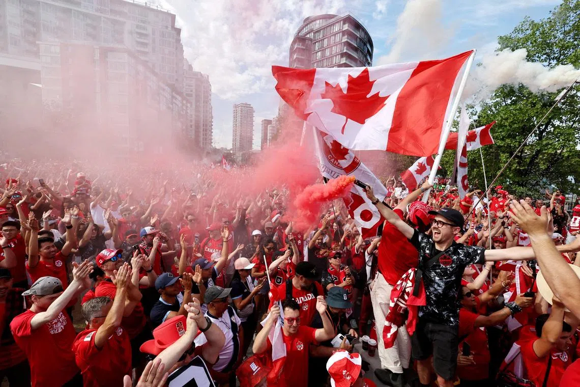 Soccer Football - FIFA World Cup 2026 - Group B - Switzerland v Canada - Canada fans march to the Stadium - BC Place, Vancouver, Canada - June 24, 2026 Canada fans during the march to the stadium REUTERS/Chris Helgren