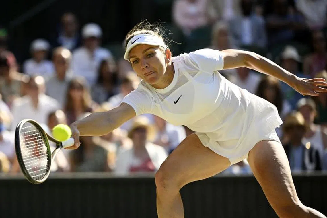 Tennis - Wimbledon - All England Lawn Tennis and Croquet Club, London, Britain - July 7, 2022  Romania's Simona Halep in action during her semi final match against Kazakhstan's Elena Rybakina REUTERS/Toby Melville/File photo