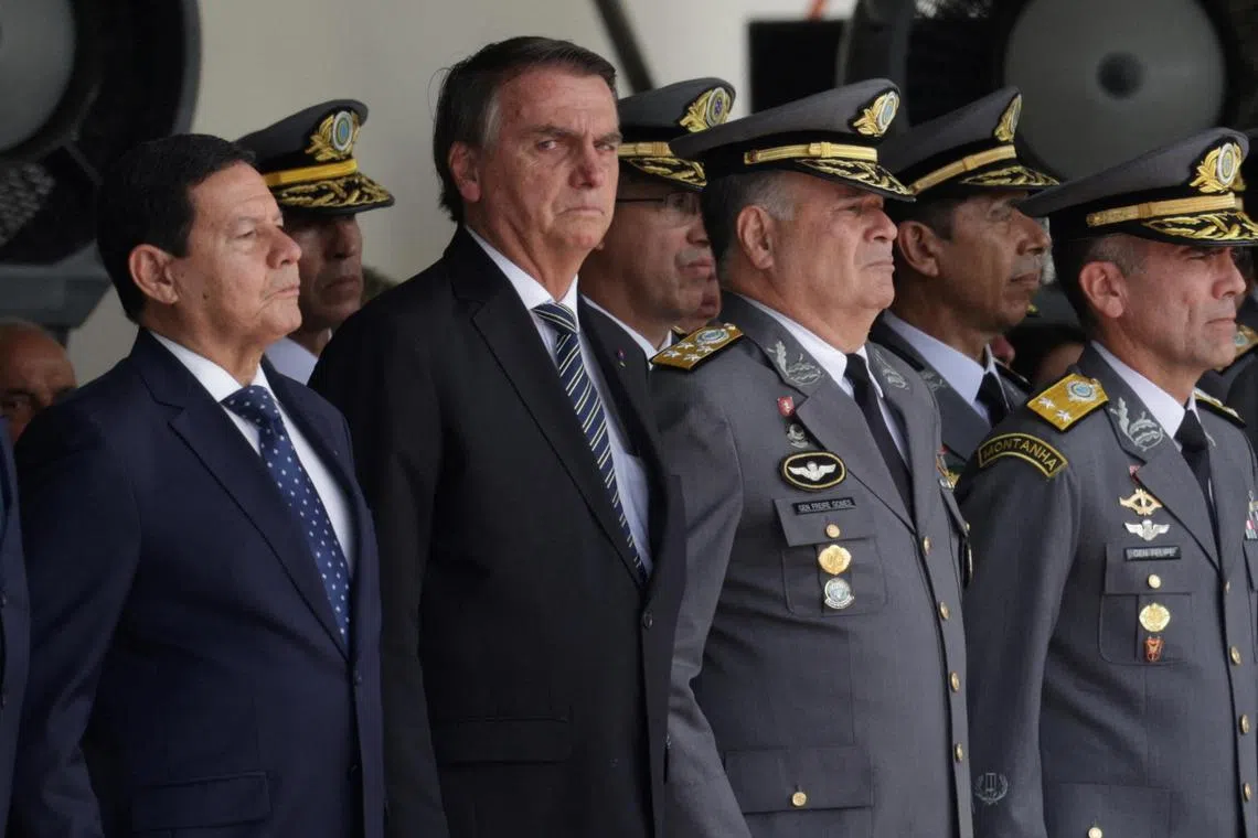 Brazil's President Jair Bolsonaro attends a graduation ceremony in Resende, on Nov 26, 2022.